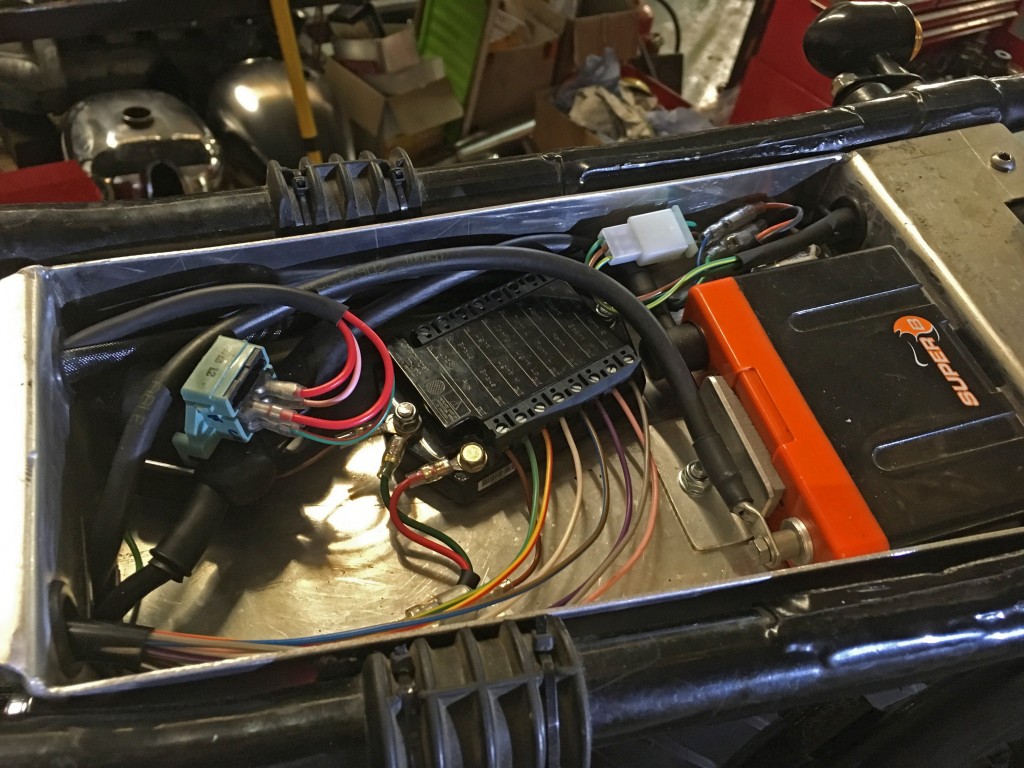 Electrics tray houses the M Unit, solenoid and lithium battery