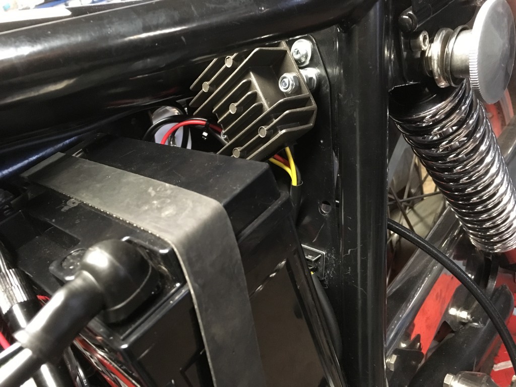 A new regulator rectifier fits behind the battery