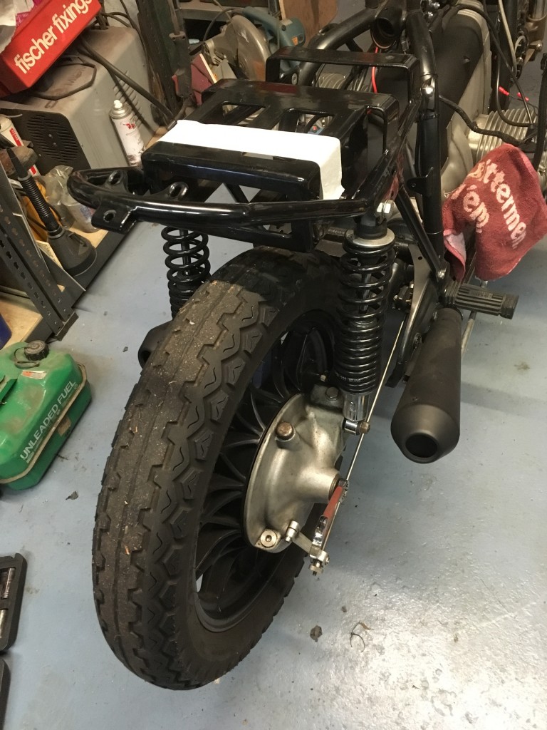 The existing battery tray fouled the rear tyre when the shocks compressed