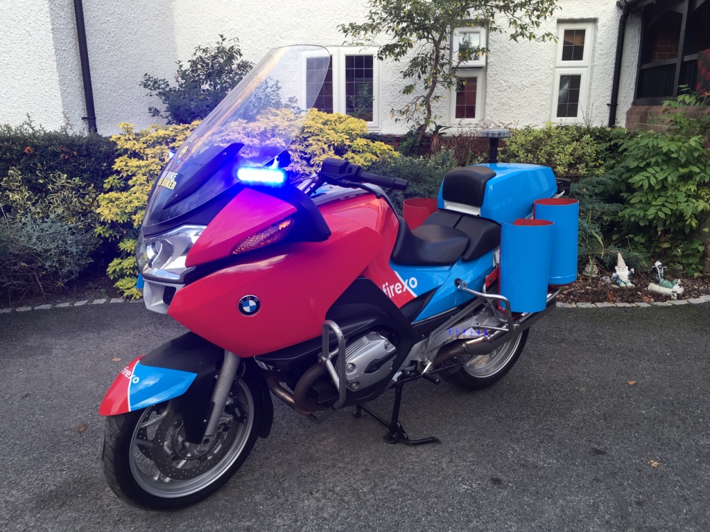 Flashing blue lights are controlled from a handlebar switch