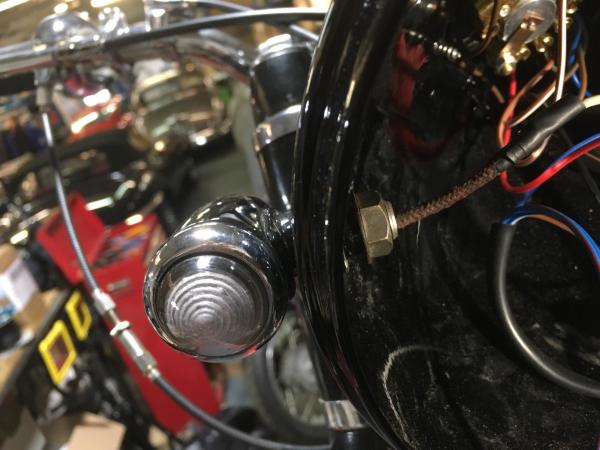 The bike had these running lights which could have converted to indicators, but they aren't very bright or big