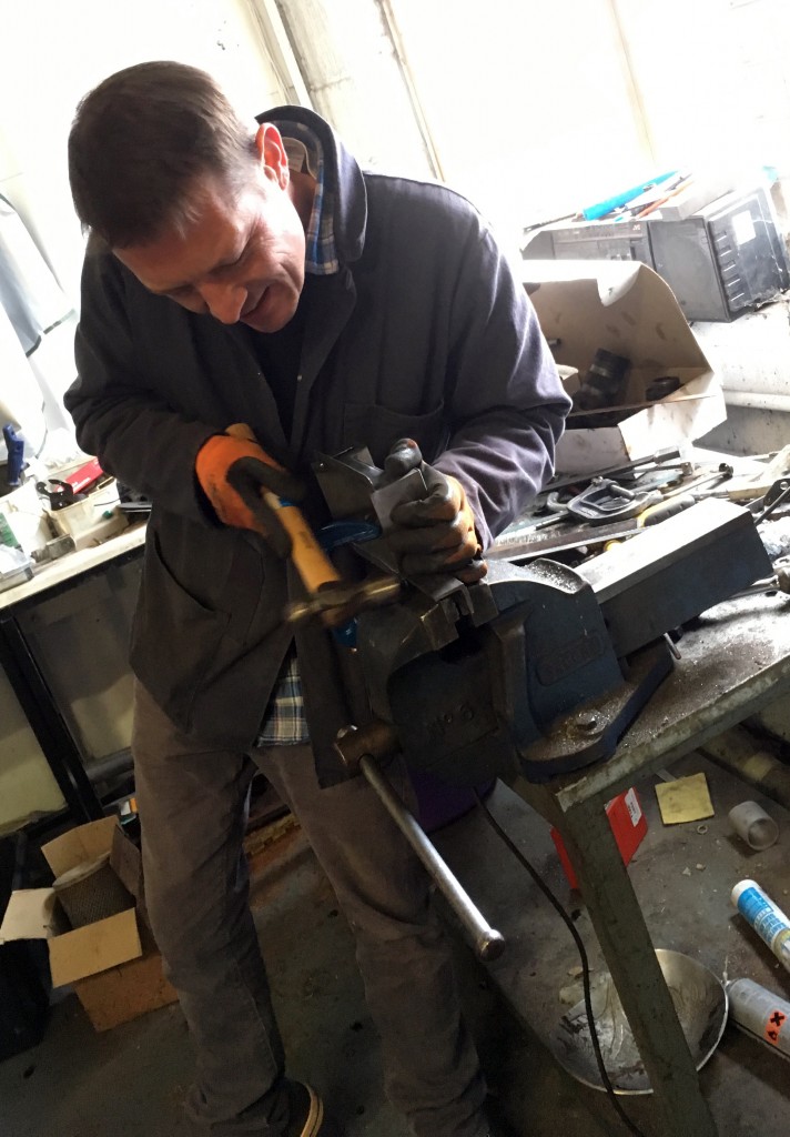 Fabricator Scott crafting the battery box cover